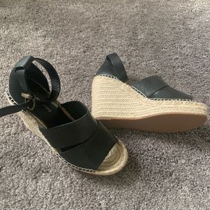 Black leather wedge sandals